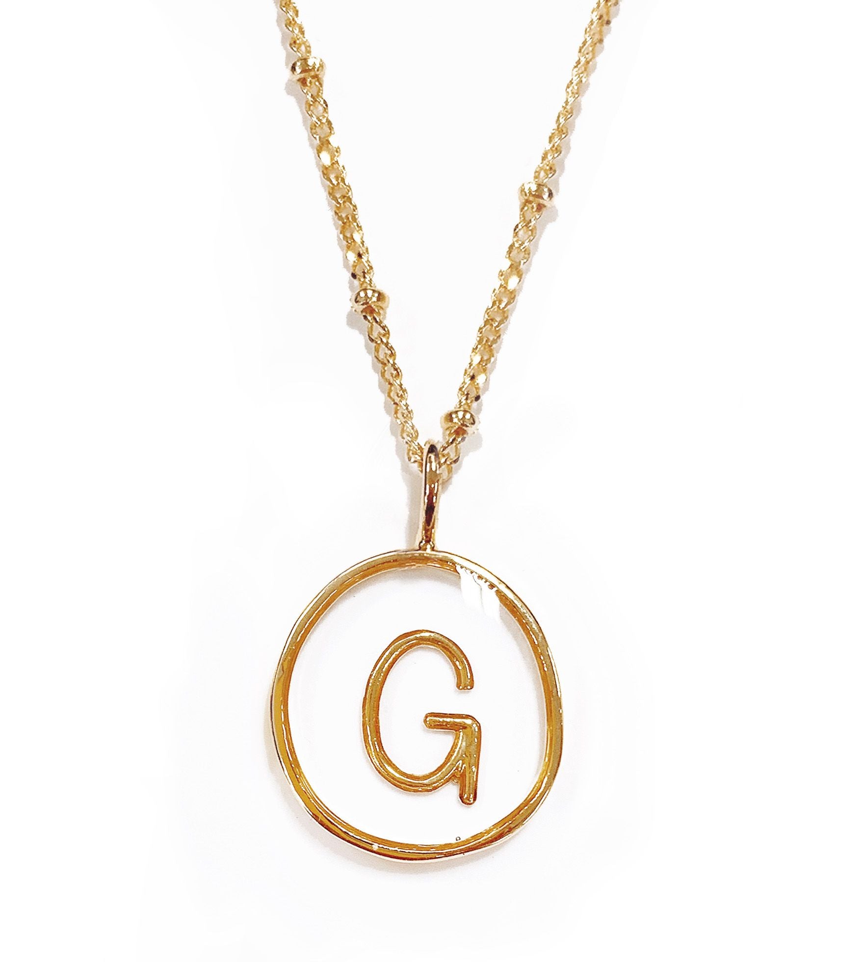 Collier lettre G doré sur pendentif transparent - 172830