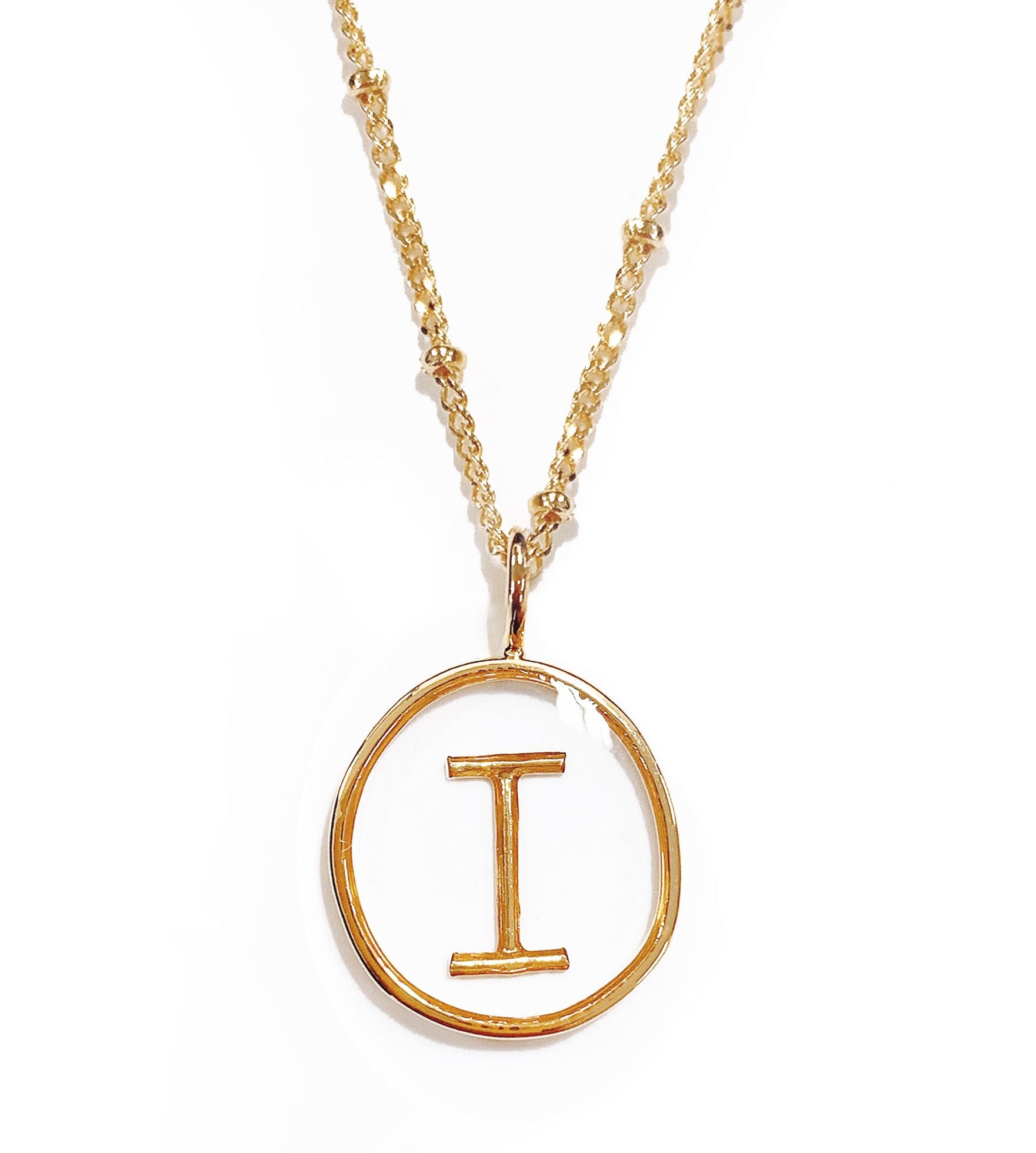 Collier lettre I en acier doré transparent - 172832